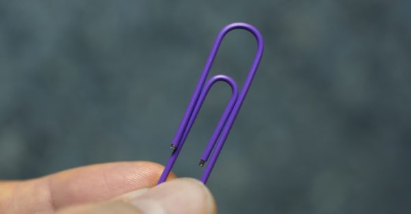 A plastic-coated paperclip